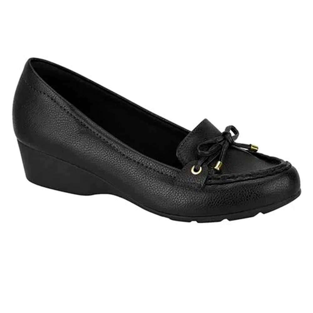 Calzado casual color negro de cuña para dama
