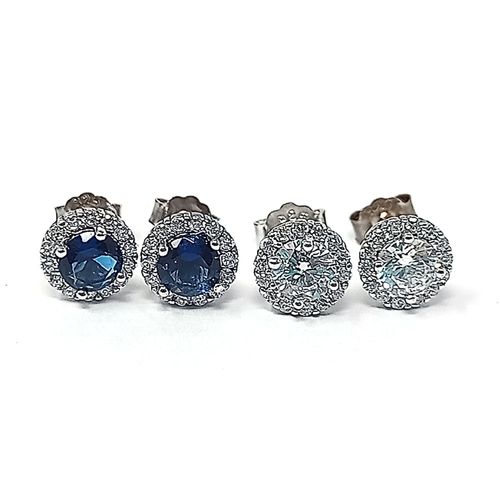 Set de 2 pares de aretes de plata en caja