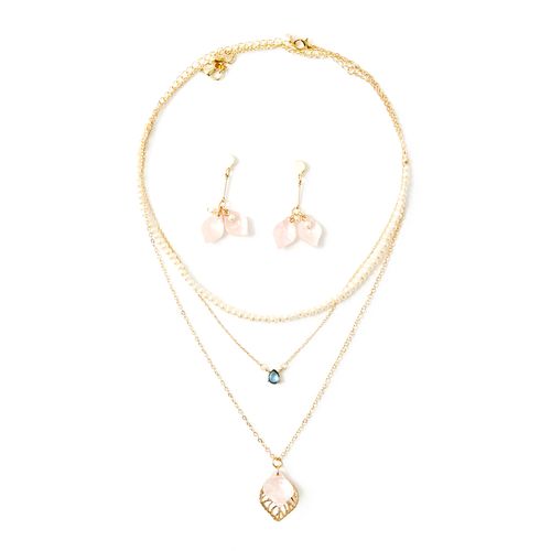 Set de collar y aretes en color dorado