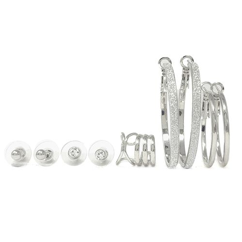 Set de aretes y earcuff color plateado para mujer