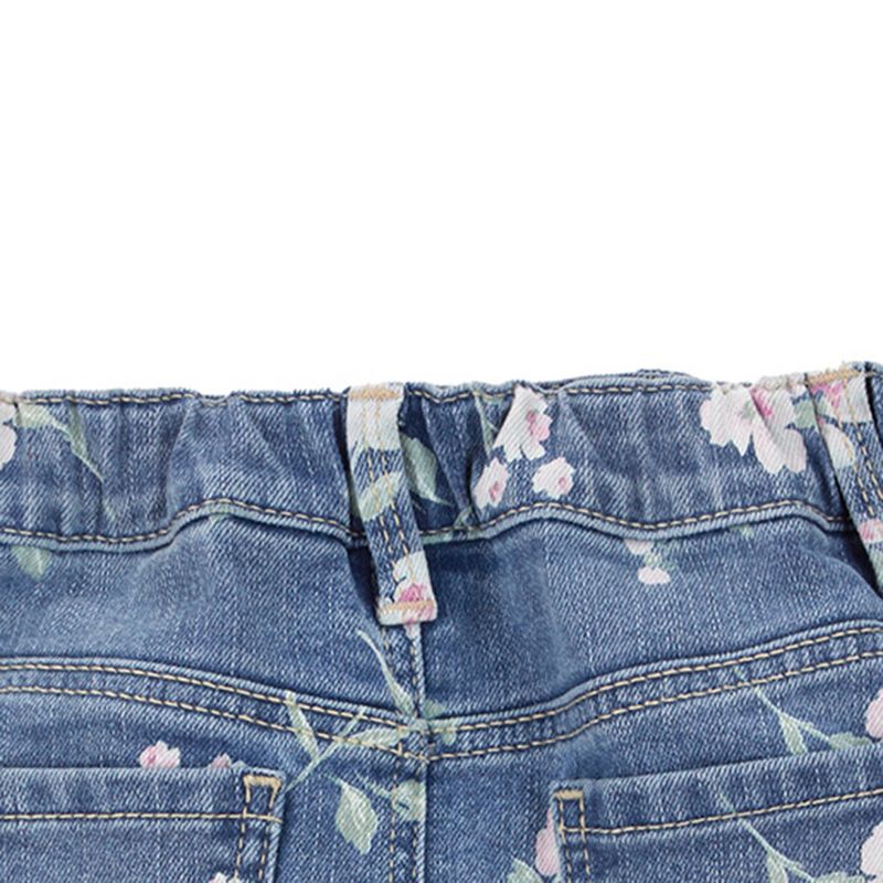 104665467-Falda-denim-azul-con-estampado-floral-para-niña