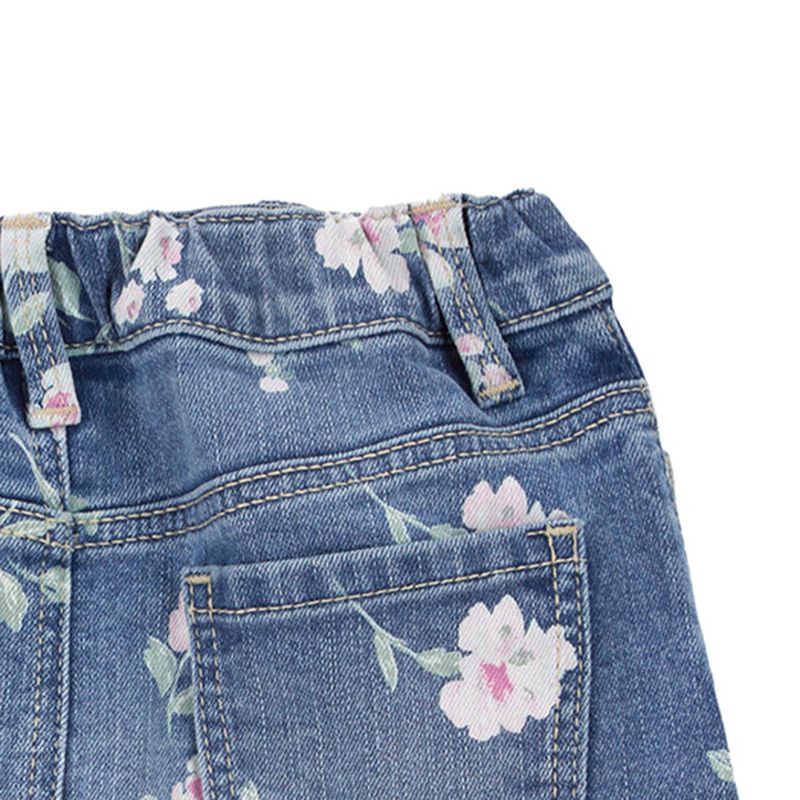 104665467-Falda-denim-azul-con-estampado-floral-para-niña
