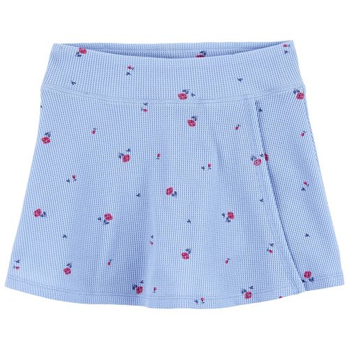 Falda short celeste con estampado floral para niña