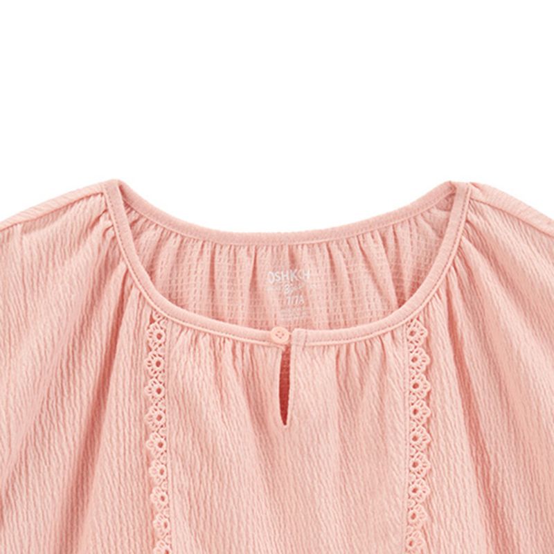 104665886-Blusa-rosada-solido-para-niña
