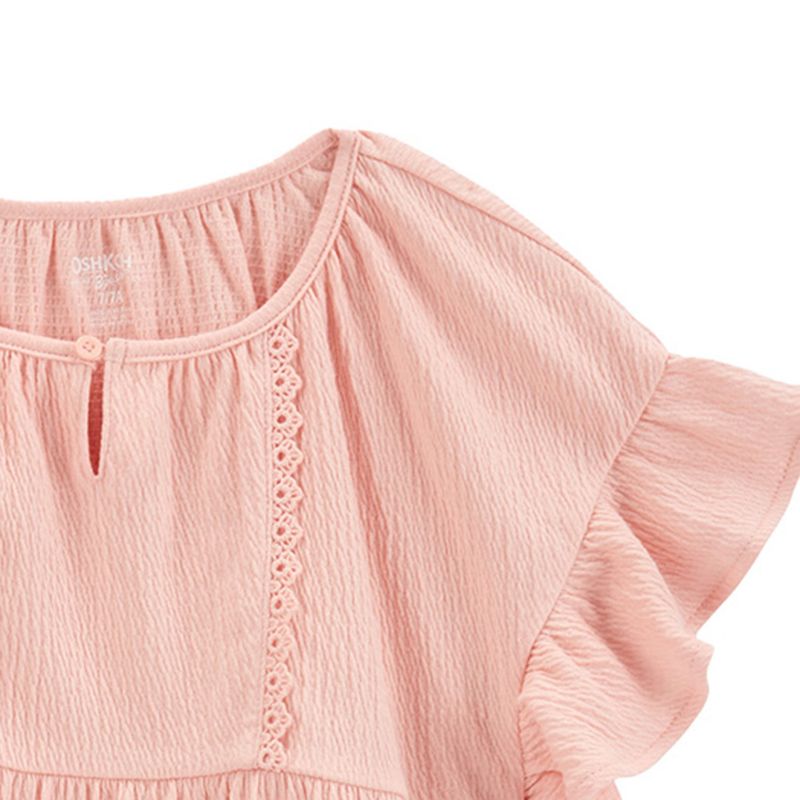 104665886-Blusa-rosada-solido-para-niña