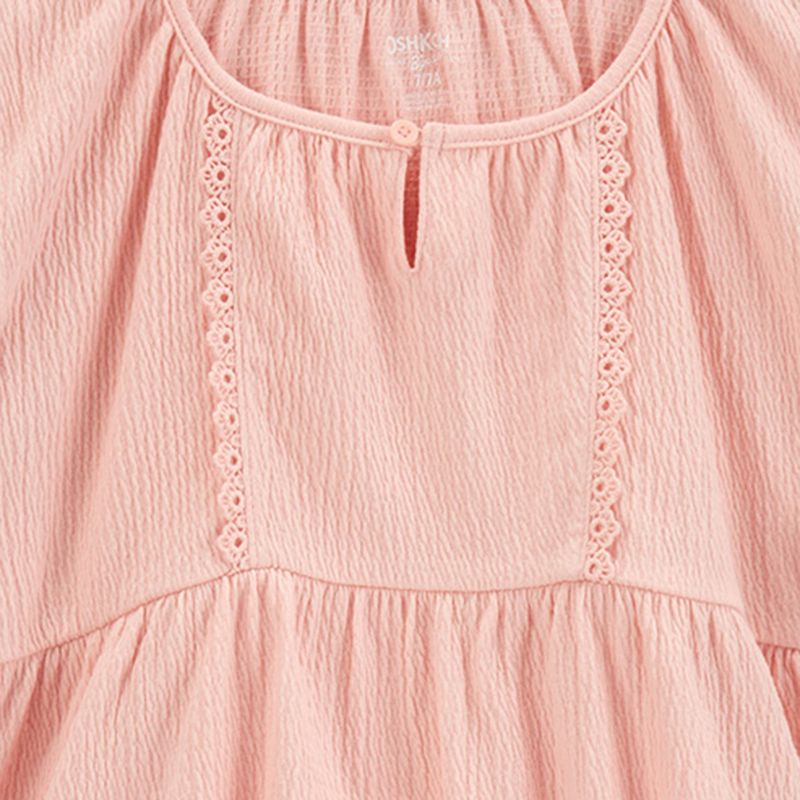 104665886-Blusa-rosada-solido-para-niña