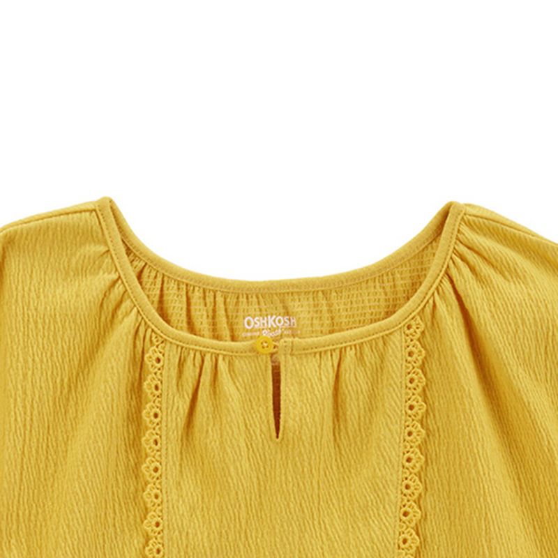 104665887-Blusa-amarilla-solido-para-niña