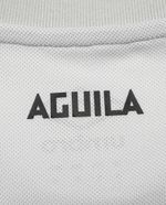 104614647-Camiseta-deportiva-blanca-Umbro-Aguila-2024-25