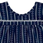 104630582-Vestido-azul-con-estampado-de-corazones-para-niña