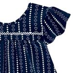 104630582-Vestido-azul-con-estampado-de-corazones-para-niña