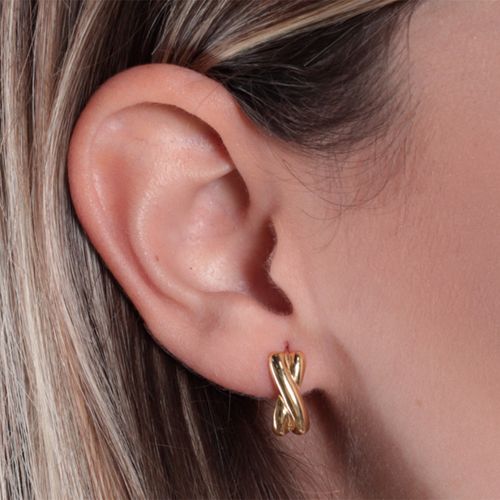 Aretes huggie de plata con baño de oro para mujer