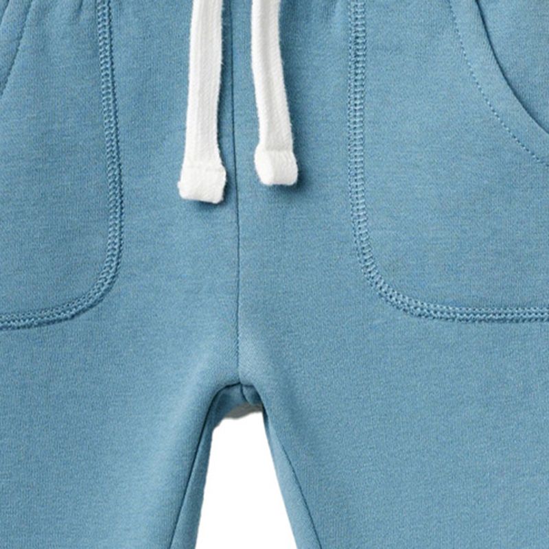 104714469-Pantalon-celeste-solido-para-bebe-niño