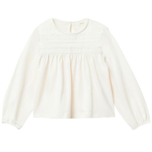 Blusa blanca sólida para niña