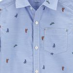 104729210-Camisa-celeste-con-estampado-de-dinosaurios-para-niño