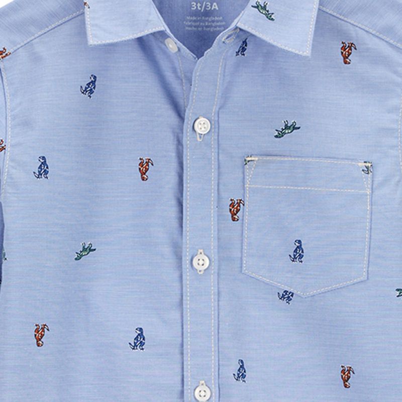 104729210-Camisa-celeste-con-estampado-de-dinosaurios-para-niño