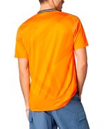 104741175-Camiseta-visitante-Adidas-Real-Madrid-anaranjada-2024-25
