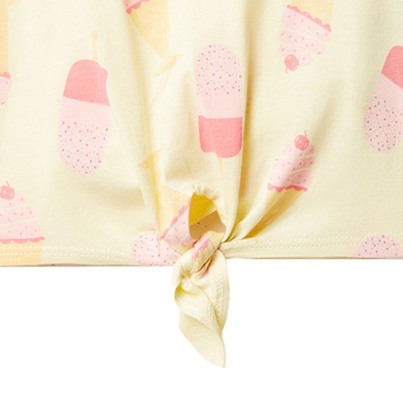 104669676-Blusa-amarilla-con-estampado-para-niña