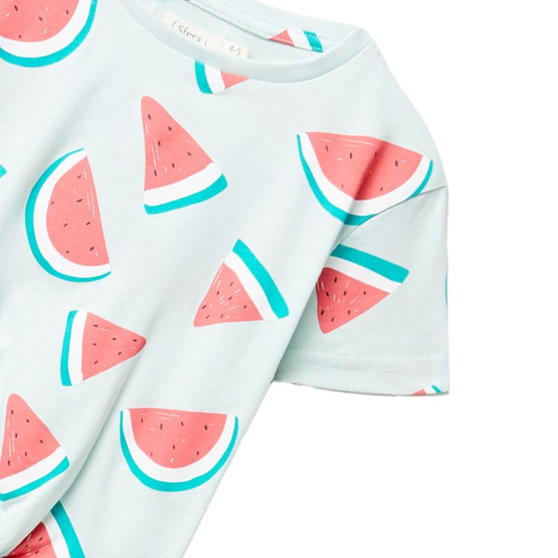 104669707-Blusa-blanca-con-estampado-para-niña