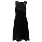 104570471-Vestido-negro-con-lentejuelas-para-niña