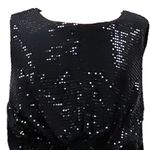 104570471-Vestido-negro-con-lentejuelas-para-niña