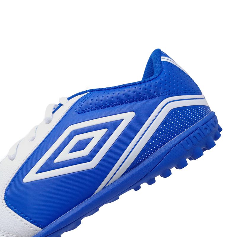 104731098-Zapatilla-deportiva-Umbro-Classico-XII-LT-TF-blanco-azul-para-hombre