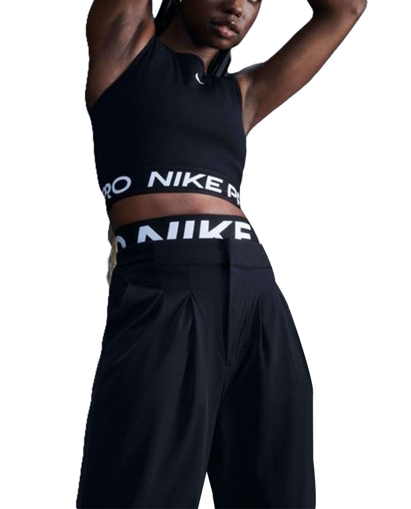104659773-Top-deportivo-Nike-sin-mangas-para-mujer