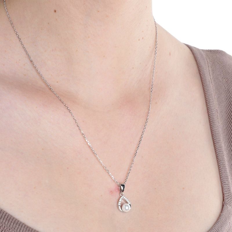 104671090-Set-de-aretes-y-cadena-con-dije-de-plata-para-mujer
