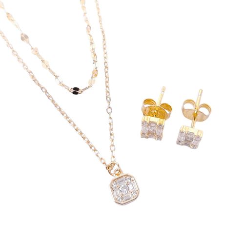 Set de aretes y cadena doble con dije de plata en baño de oro para mujer