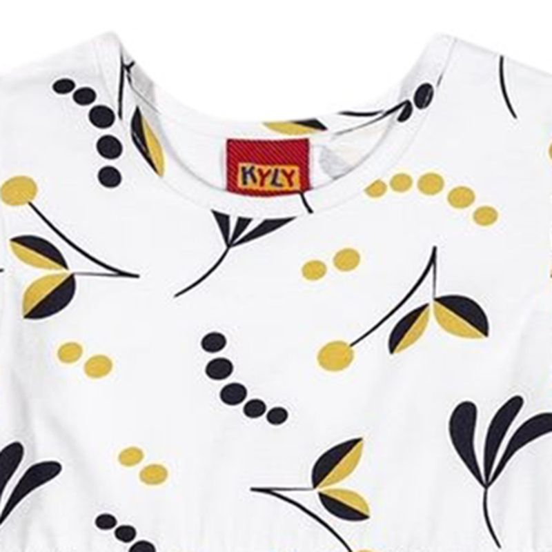 Vestido-blanco-con-estampado-para-niña-104789091