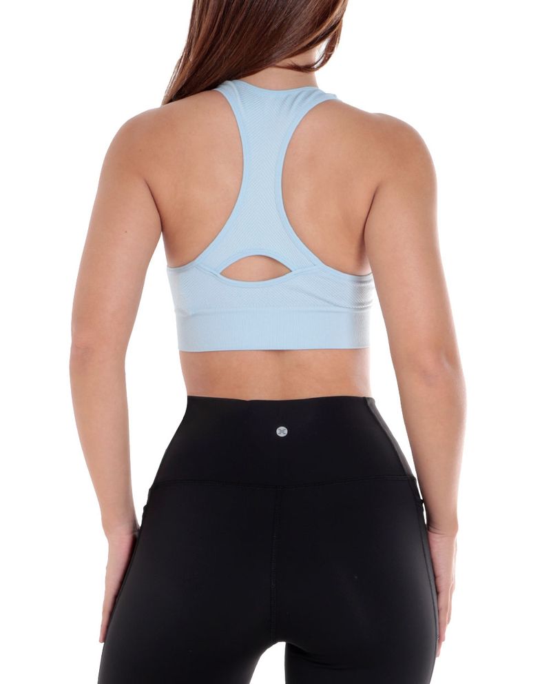 104754237-Set-de-tops-deportivo-RBX--blanco-celeste--para-mujer