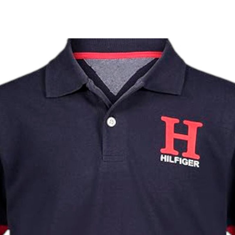 Camisa-polo-bicolor-con-estampado-para-niño-104754684