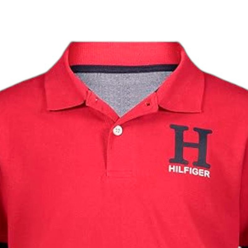 Camisa-polo-bicolor-con-estampado-para-niño-104754688