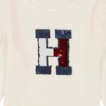 Blusa-blanca-lentejuelas-para-niña-104721329