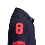 Camisa-polo-bicolor-con-estampado-para-niño-104754684