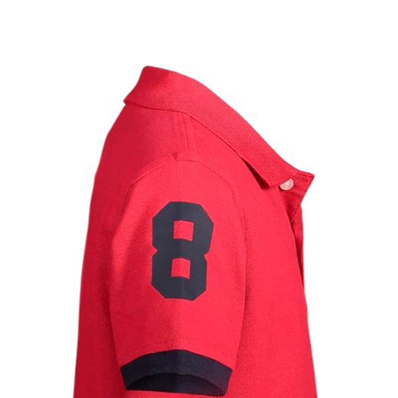 Camisa-polo-bicolor-con-estampado-para-niño-104754688