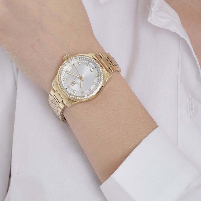 104789455-Reloj-tommy-analogo-th85-crystals-de-acero-en-dorado-con-esfera-plateada-para-dama