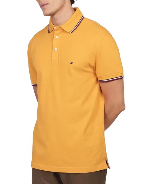 Camisa polo slim fit Tommy Hilfiger amarilla sólida para hombre