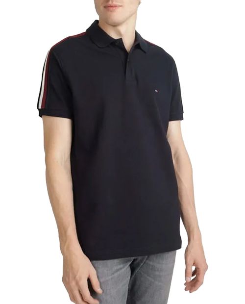 Camisa polo regular fit Tommy Hilfiger azul oscuro sólida para hombre