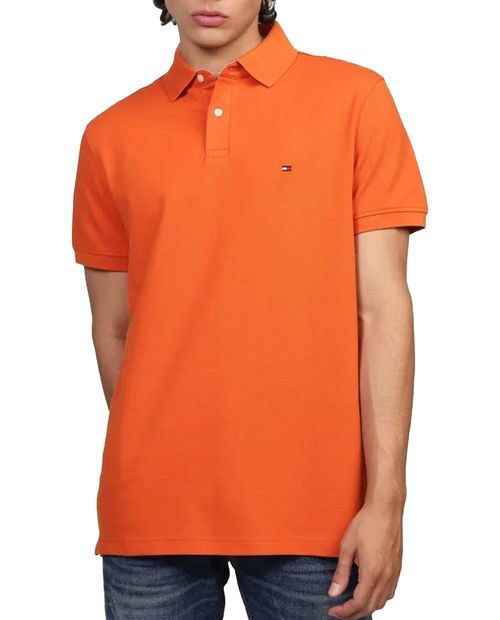 Camisa polo básica regular fit Tommy Hilfiger anaranjada sólida para hombre