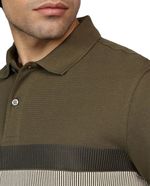 104804431-Camisa-polo-regular-fit-Tommy-Hilfiger-verde-color-blocking-para-hombre