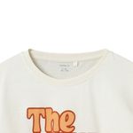 Blusa-blanca-con-estampado-para-niña-104799403