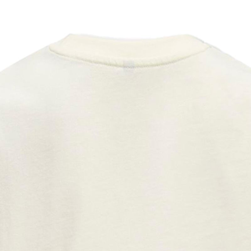 Blusa-blanca-con-estampado-para-niña-104829604