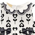 104824118-Vestido-blanco-con-estampado-para-niña
