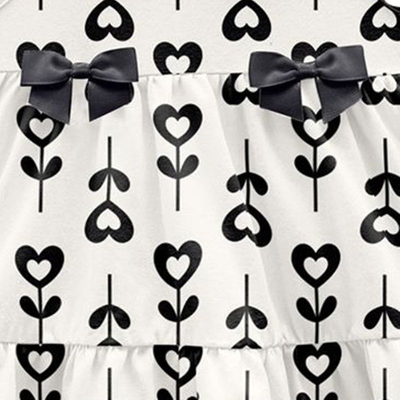 104824118-Vestido-blanco-con-estampado-para-niña