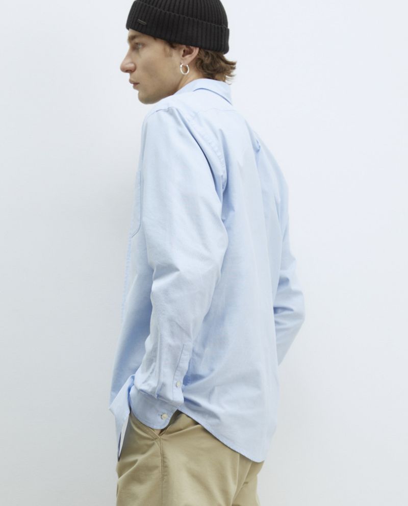 104835366-Camisa-oxford-Sfera-regular-fit-celeste-solida-para-hombre