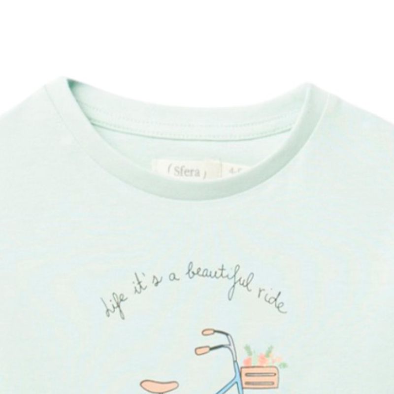 Blusa-verde-con-estampado-para-niña-104831732