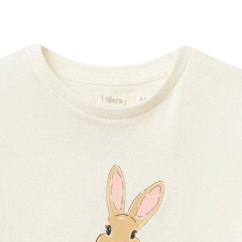 Blusa-blanca-con-estampado-para-niña-104831736