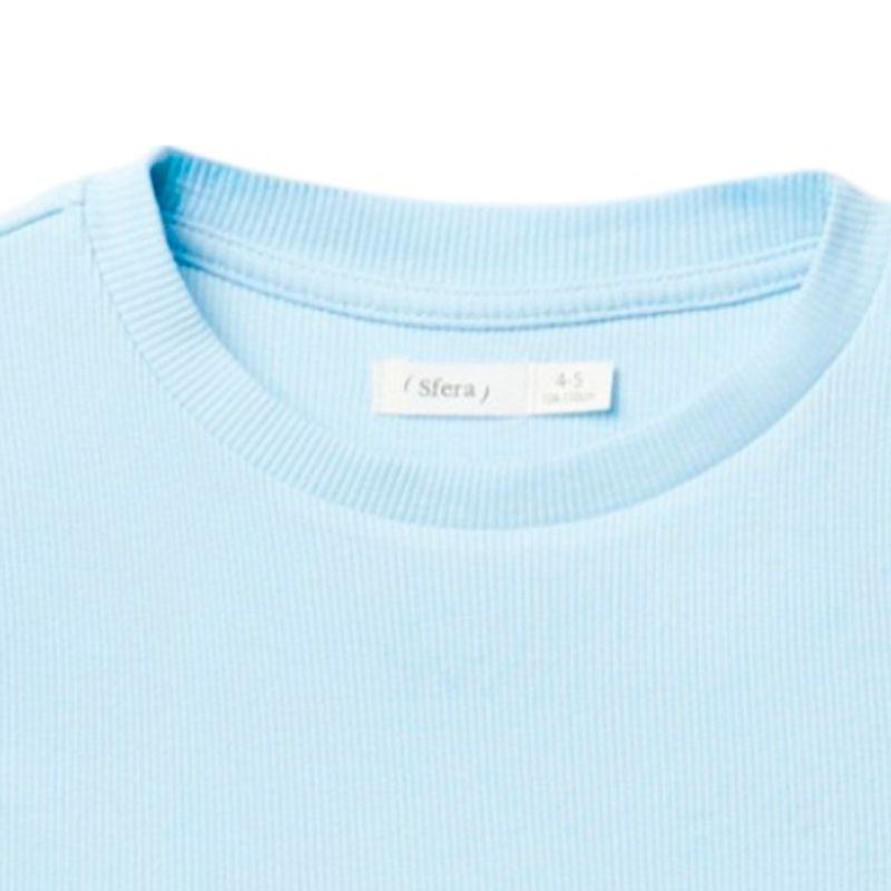 Blusa-celeste-solido-para-niña-104831854