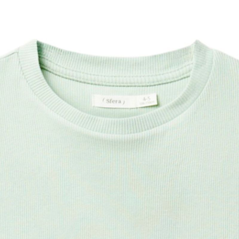 Blusa-verde-solido-para-niña-104831864