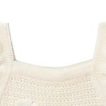 Blusa-blanca-con-crochet-para-niña-104831954